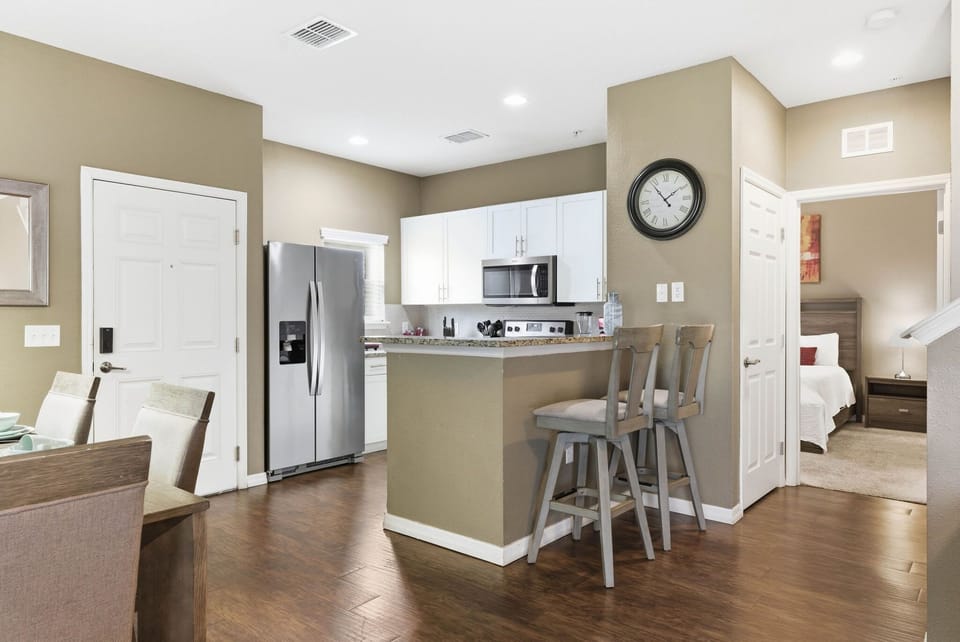 Living area highlighting the kitchen