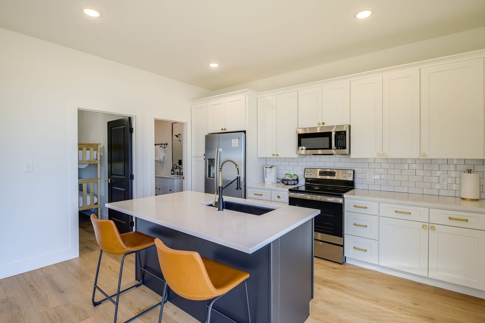 Modern kitchen with island and dining space
