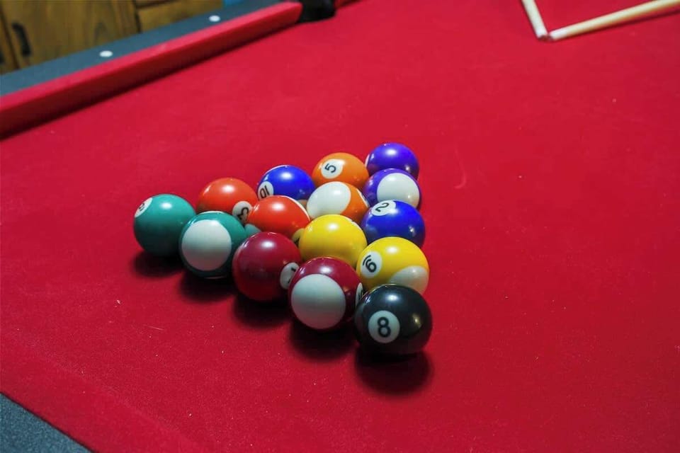 Rack 'em up and enjoy endless fun in this vibrant pool paradise!