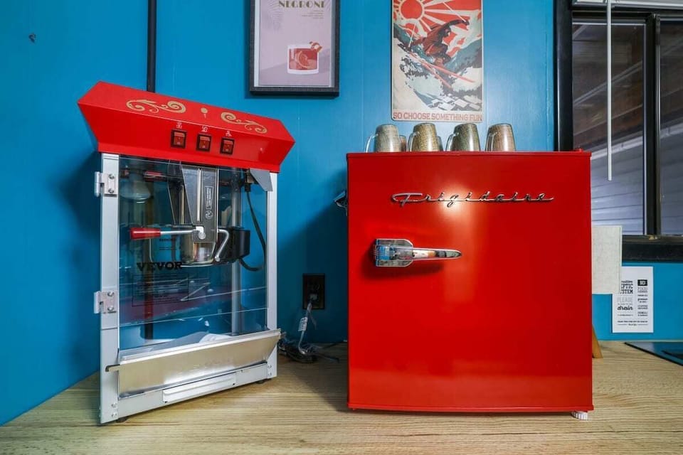 Enjoy fresh popcorn and chilled drinks in this vibrant, retro-inspired nook!