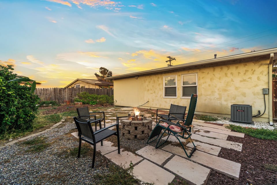 Outdoor space featuring a fire pit, perfect for gathering and starry nights.