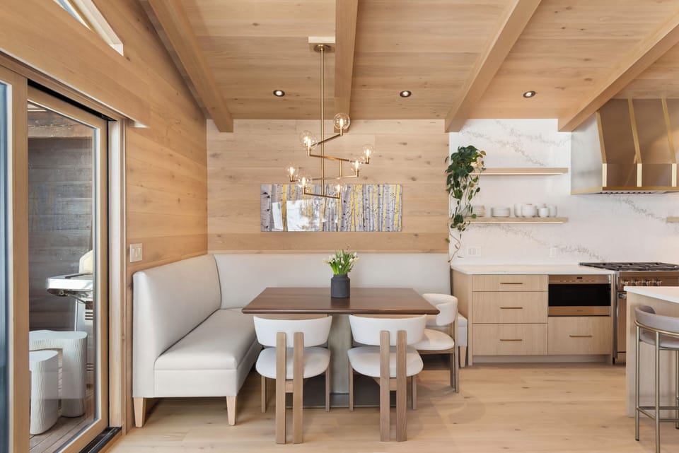 The dining and kitchen flow seamlessly on the main floor of the home.