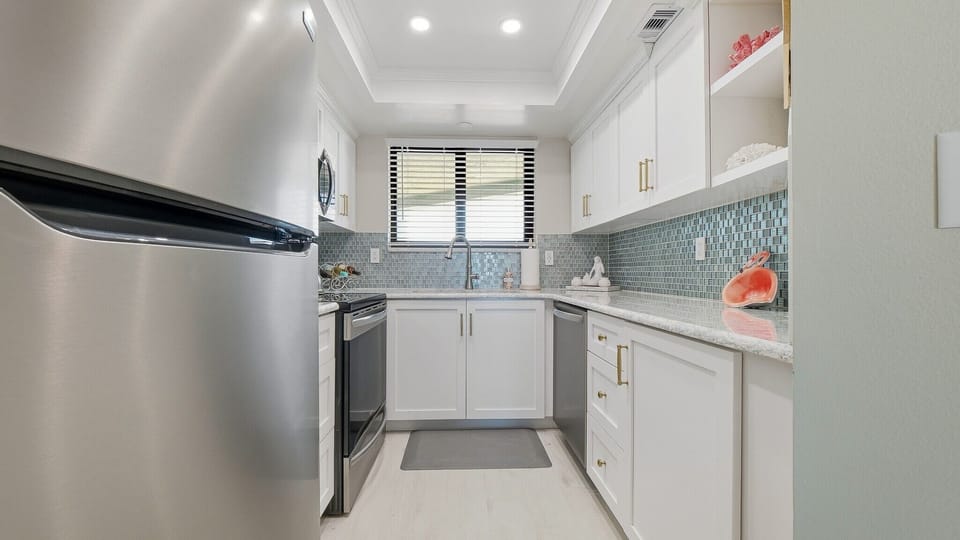 Jeff and Gina Properties - Ocean Trillium 502 - New Smyrna Beach - 1 BR - 1 BA - Beach Views - next door to Chase's on the Beach
