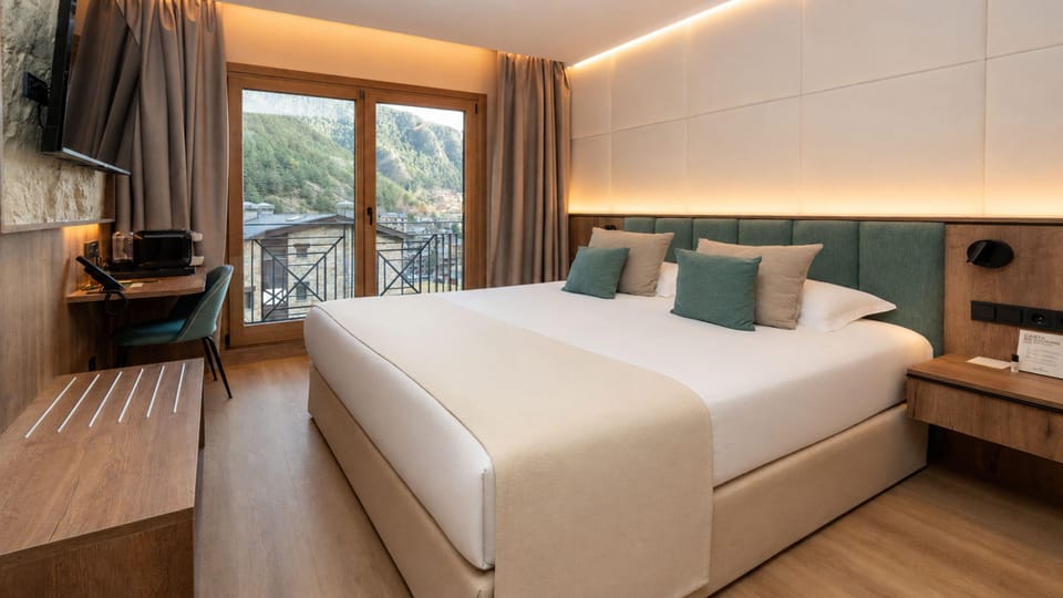 Quadruple Premium con Vistas | Premium bedding, down comforters, minibar, in-room safe