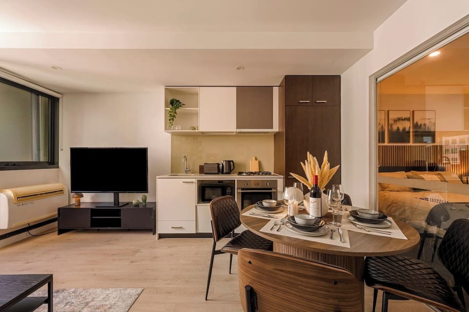Open-plan kitchen and dining designed for a seamless and comfortable stay.