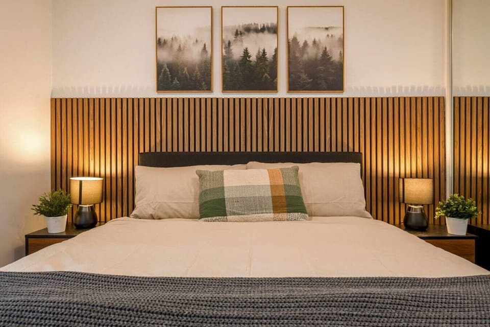 Plush bedding and soft ambient lighting designed for a comfortable night’s sleep.