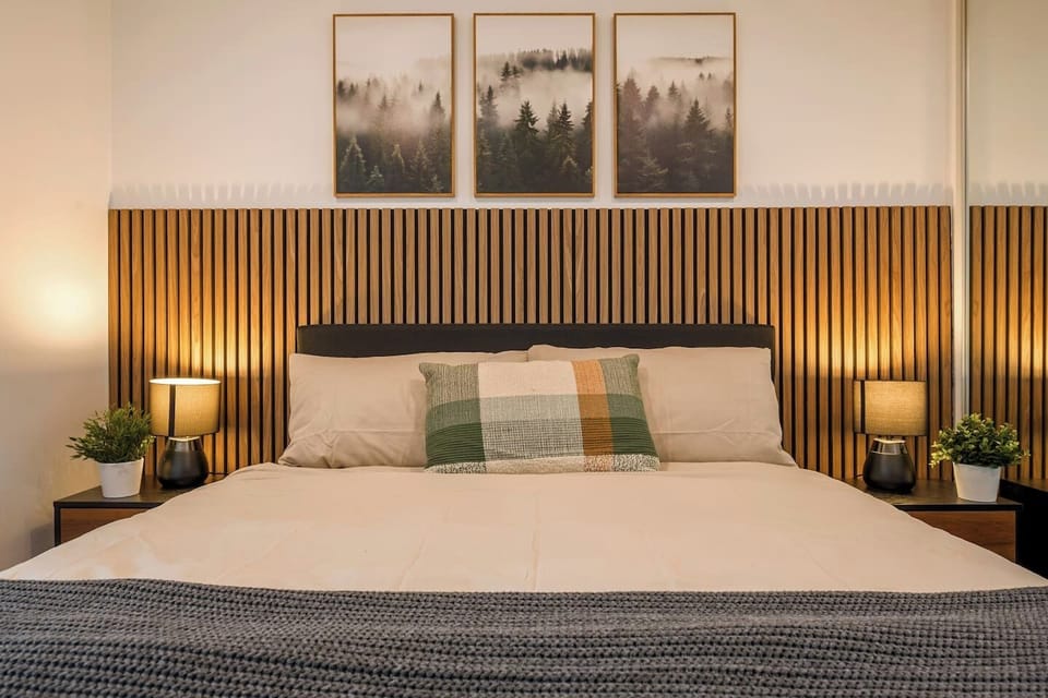Plush bedding and soft ambient lighting designed for a comfortable night’s sleep.