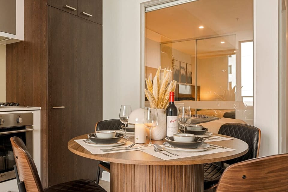 A warm, styled dining space perfect for meals, wine, or relaxed evenings in.