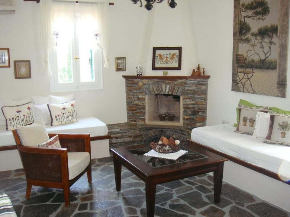Family Suite, Balcony, Partial Sea View | Living area | TV