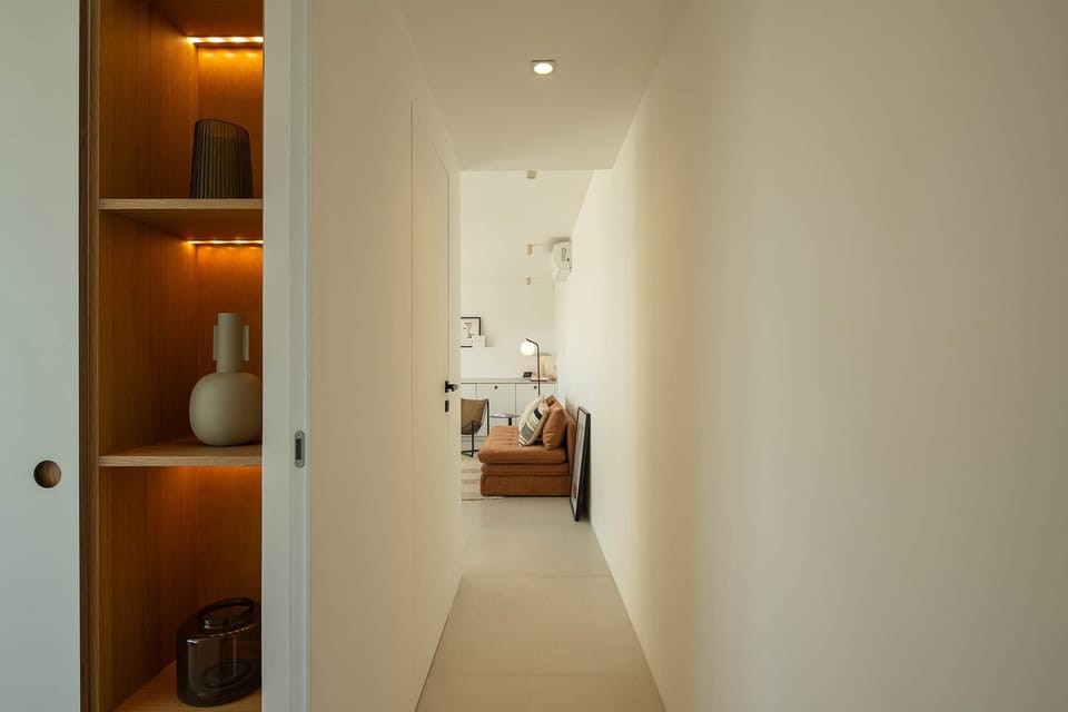 A cozy hallway with soft lighting that adds a warm touch to your stay
