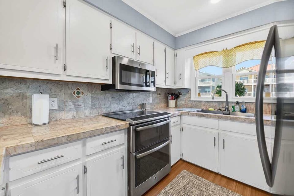 Fully equipped kitchen with stainless steel appliances