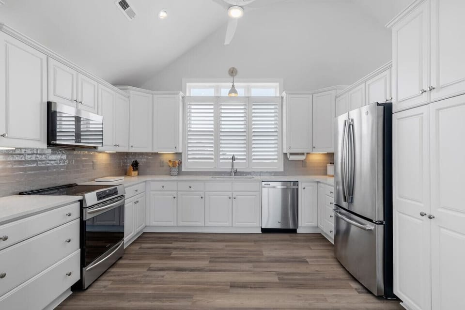 Spacious, fully equipped kitchen with modern appliances and plenty of room to cook, entertain, and connect.
