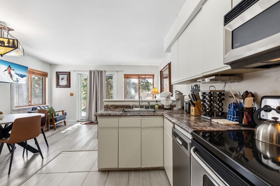 Your spacious open-plan kitchen flows seamlessly into the dining and living area, perfect for cooking memorable meals and gathering together.