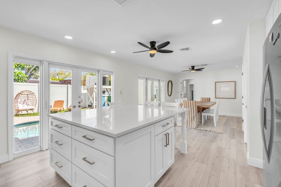 Spacious Living Area with Access to the Pool Deck - 1st Level