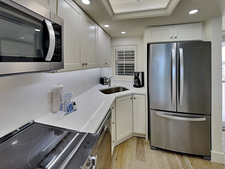 Fully Equipped Kitchen with Stainless Steel Appliances