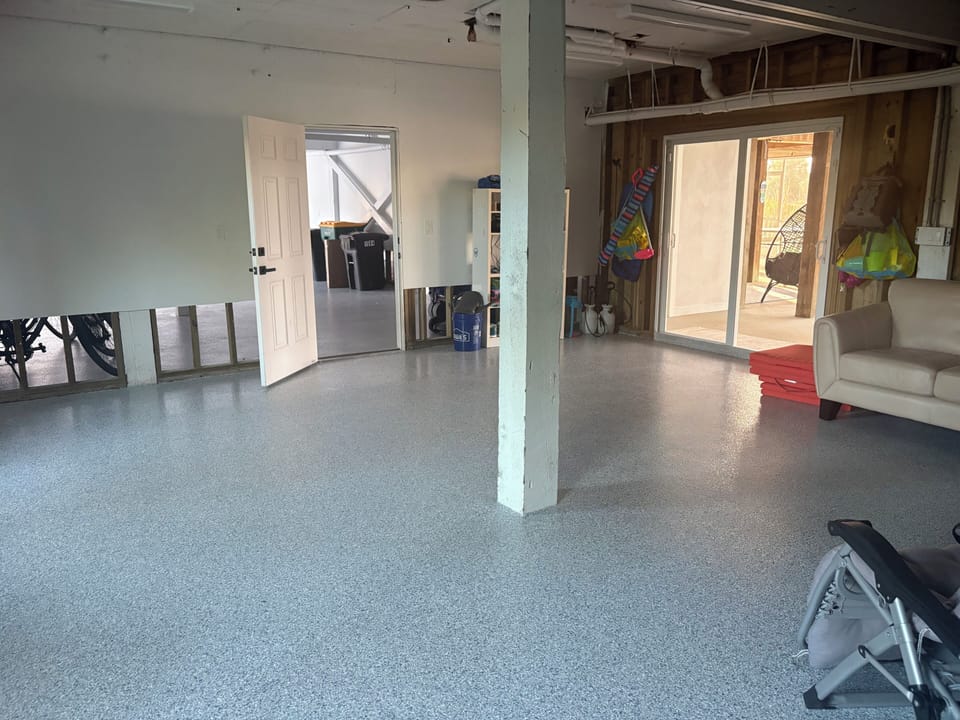 Vast room attached to the garage that stores all the beach toys and other items.