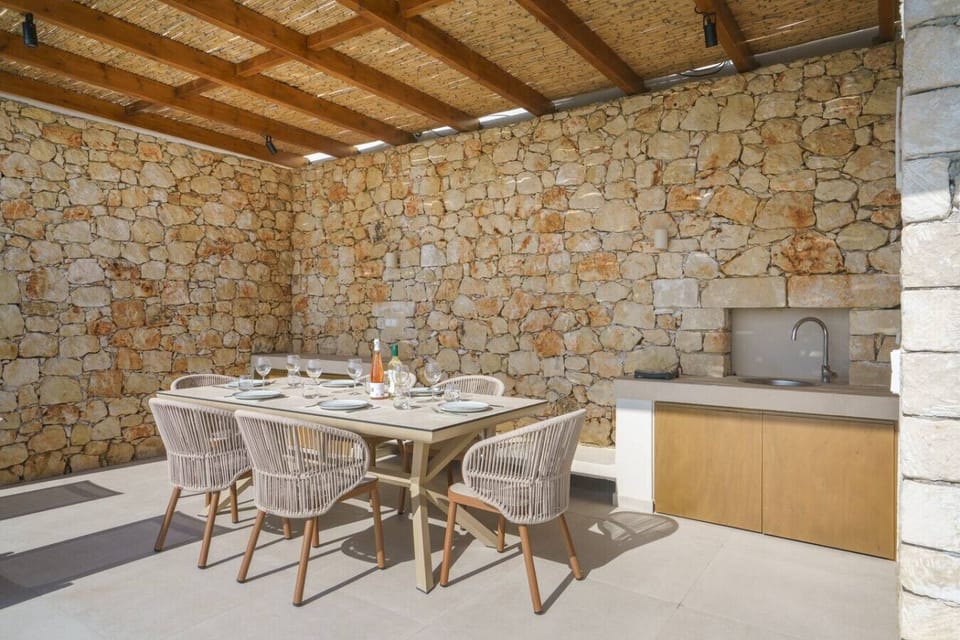 Outdoor BBQ and dining area, perfect for gathering around in the evenings