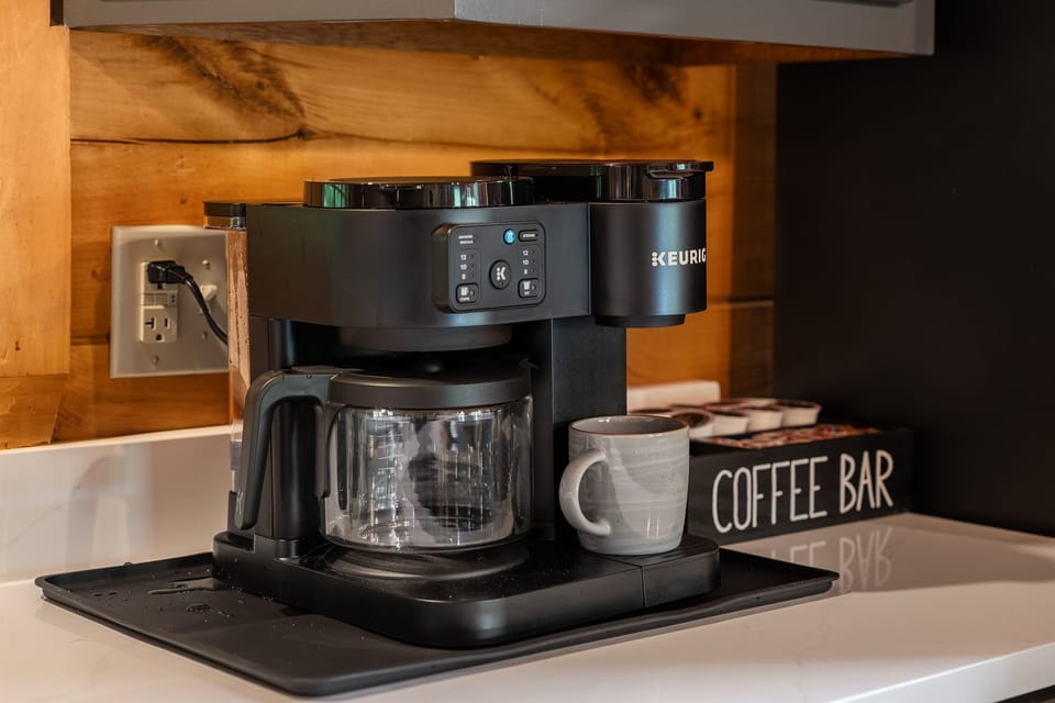 Start your mornings at the dedicated coffee bar, complete with K-cups, cream and sugar to help you ease into the day before heading out to explore.