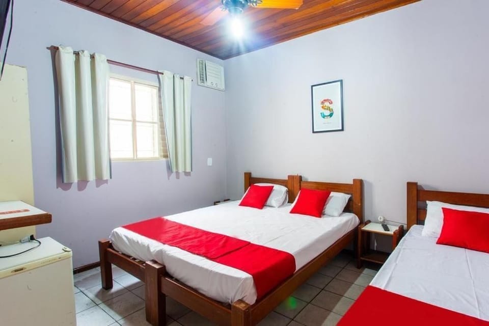Standard Triple Room, Patio | Laptop workspace, blackout drapes, iron/ironing board, free WiFi