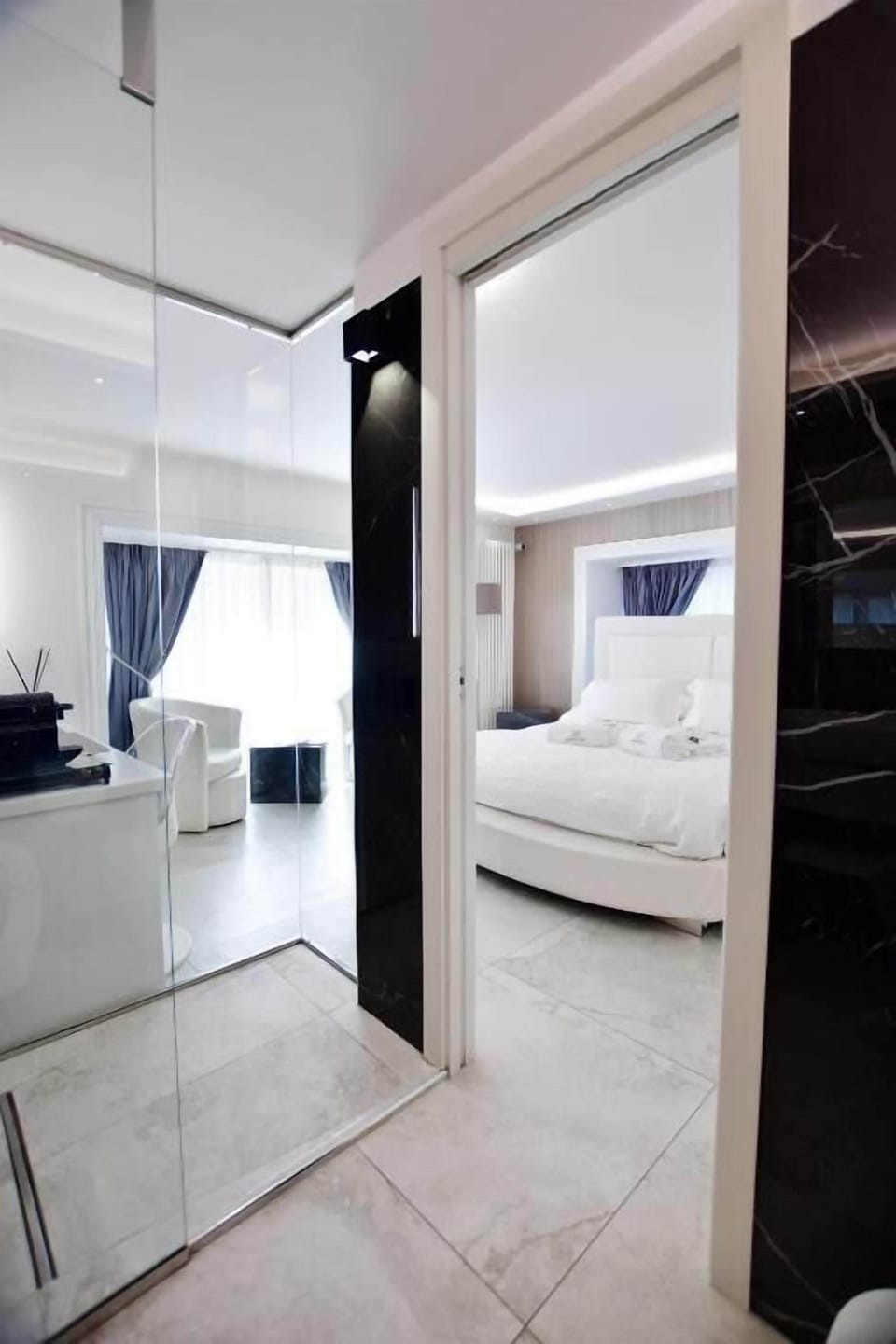 Premium Suite, 1 King Bed, Private Bathroom, City View | In-room safe, desk, laptop workspace, blackout drapes