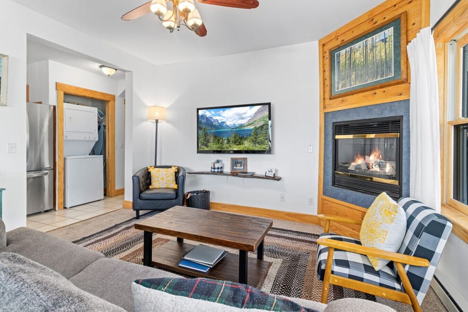 Inviting living space with fireplace and mountain charm