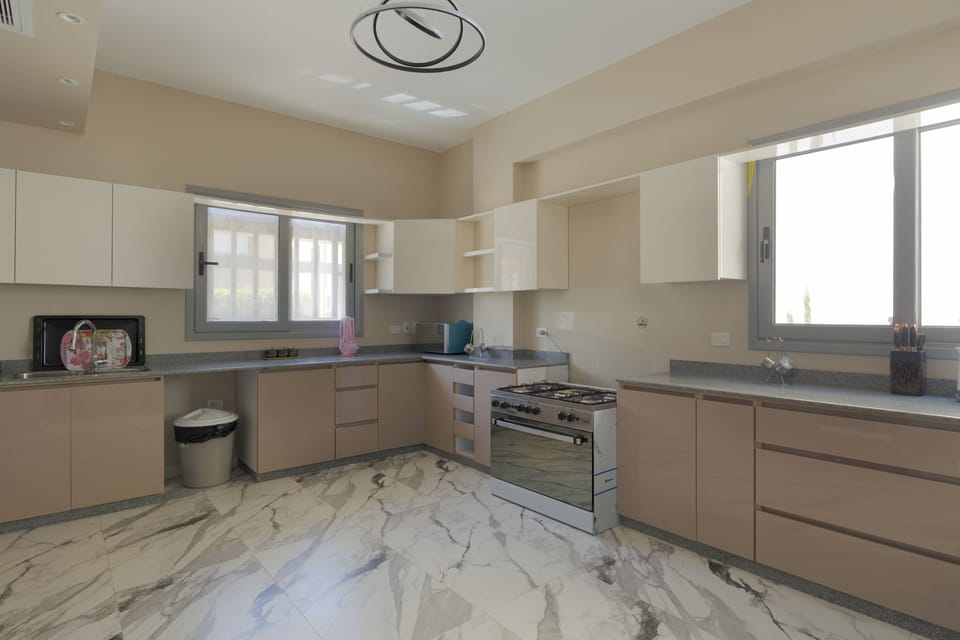 Luxury Villa, 4 Bedrooms, Garden View | Private kitchen | Full-size fridge, microwave, oven, stovetop
