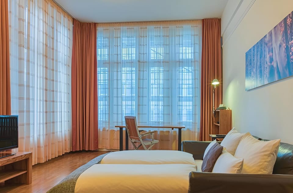 Family Studio Suite, Multiple Beds, Kitchenette | Desk, laptop workspace, free WiFi