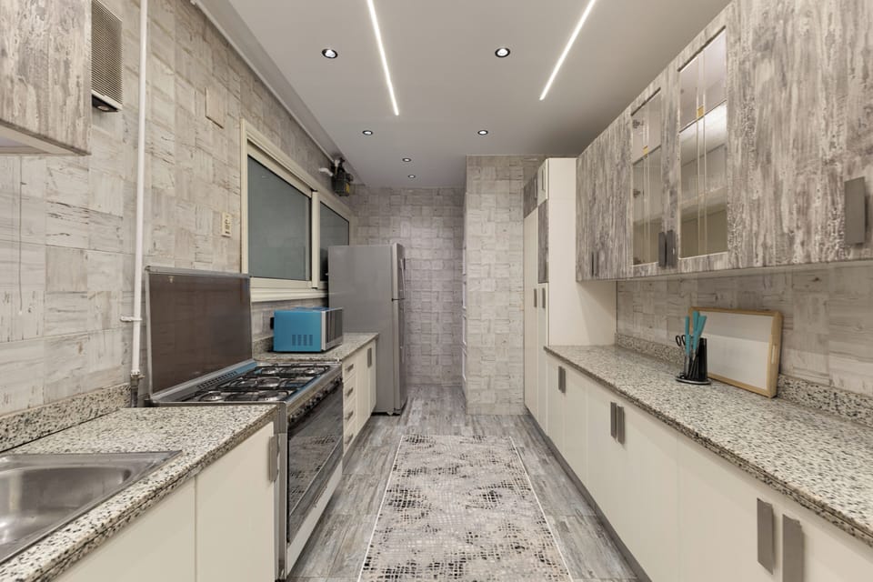 Comfort Apartment, River View | Private kitchen | Microwave, oven, stovetop, cookware/dishes/utensils