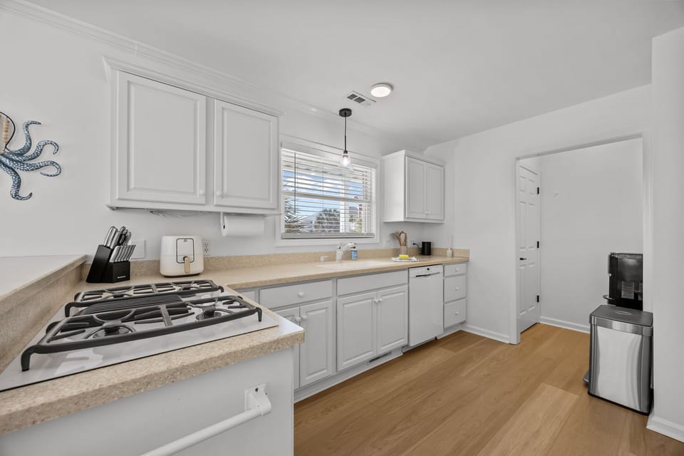 Fully equipped kitchen with plenty of counter space and everything you need to cook during your stay