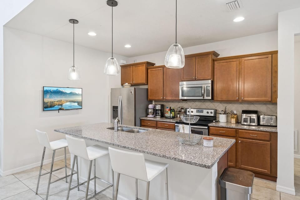 Modern kitchen with spacious island and sleek appliances