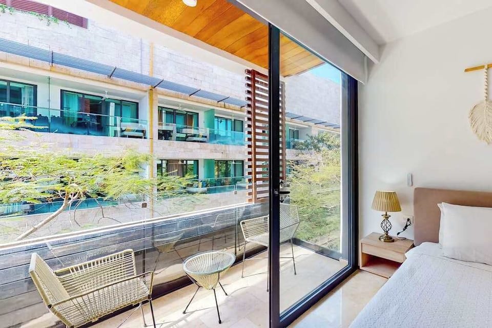 Private balcony with seating and open town views