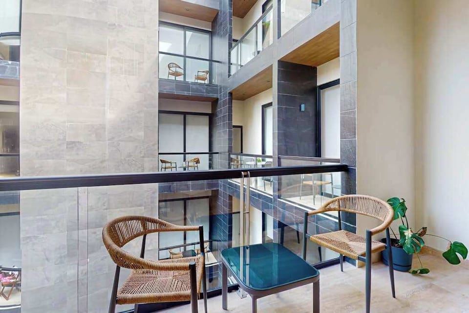 Shared rooftop terrace with plunge pool and seating