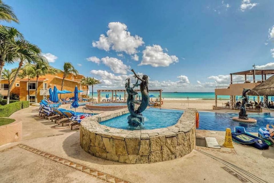 Resort pool with loungers