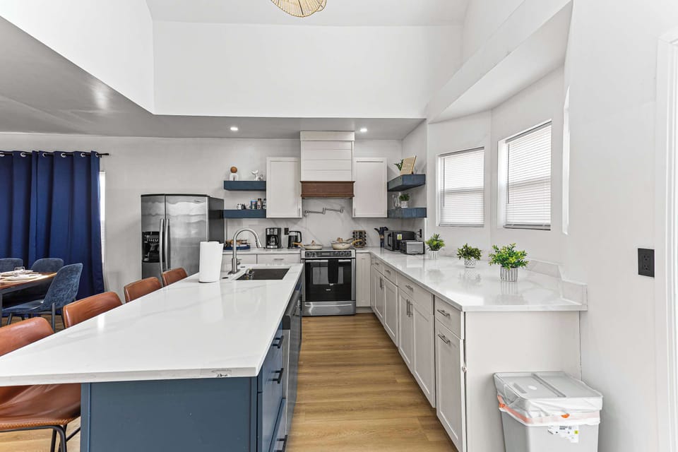 Cook with ease in a fully equipped kitchen designed for convenience, whether preparing a quick breakfast or a full meal.