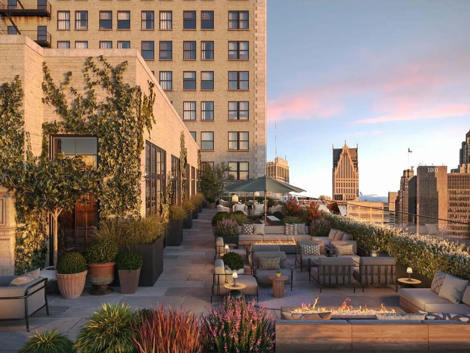 Enjoy skyline views and a relaxed evening at Kamper’s Rooftop, perfect for drinks, socializing, and unwinding just minutes from your stay.