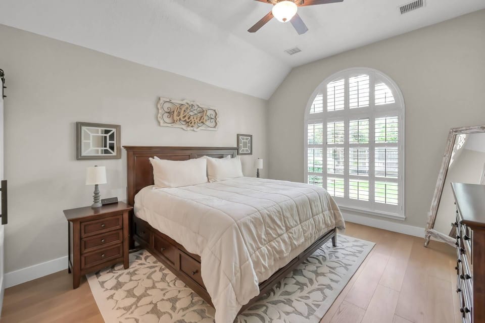 Primary bedroom with a king bed