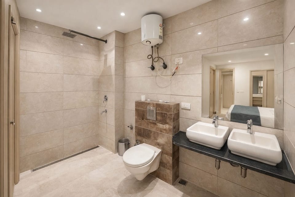Shower, designer toiletries, hair dryer, slippers