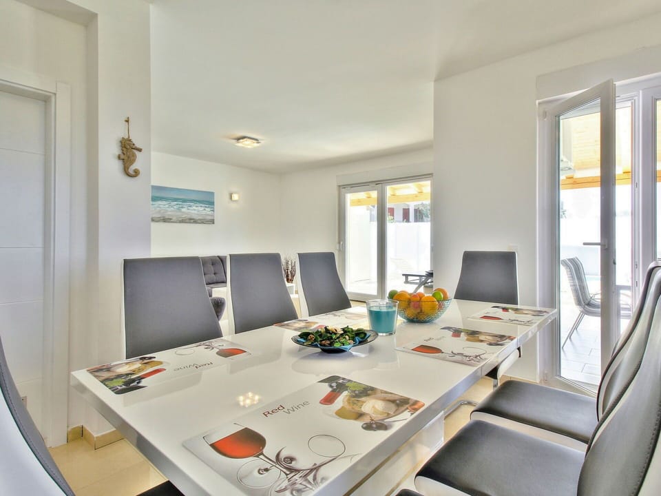 Interior Design, Furniture, Flooring, Floor, Ceiling, Table, Dining Room, Room, Lighting, Home