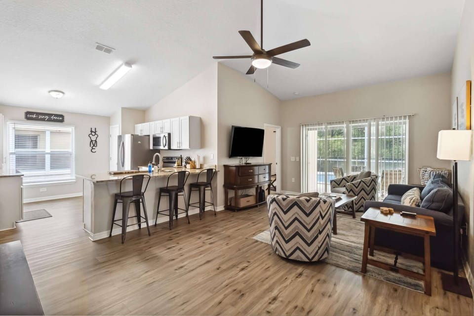 Single level living with plenty of room for your full family! Open concept kitchen, dining and living areas with access to the pool