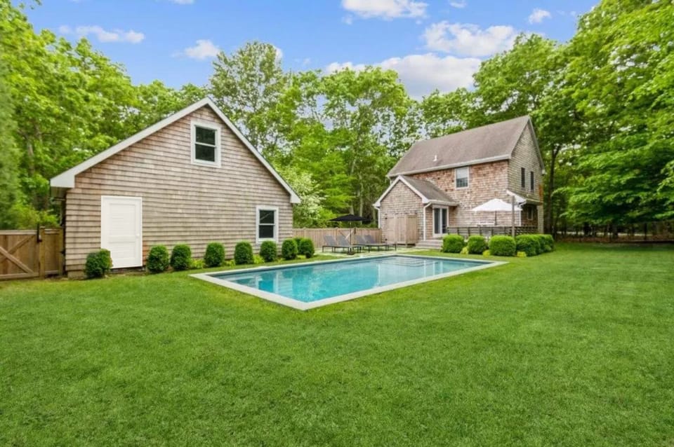 Backyard with garage shown (left structure)