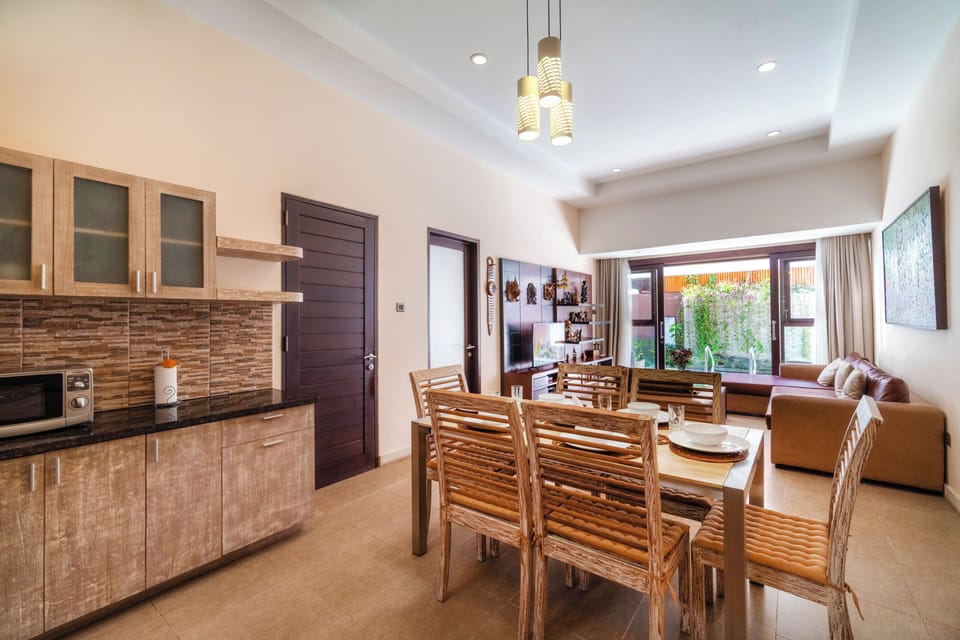 Family Villa | Private kitchen | Microwave, stovetop, cookware/dishes/utensils