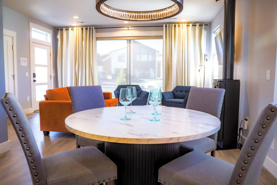 Dining Room seats up to 6 with the extra chairs provided in the garage.
