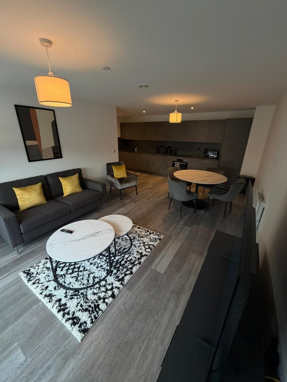 Comfort Apartment | Living area | 55-inch Smart TV with digital channels