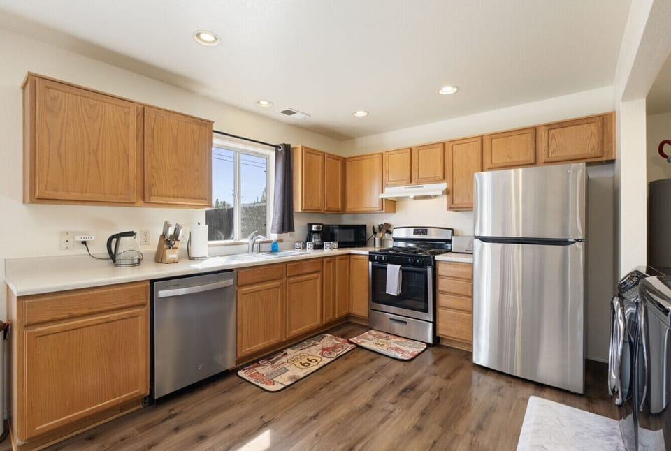 Spacious kitchen layout with plenty of prep space and room to spread out.