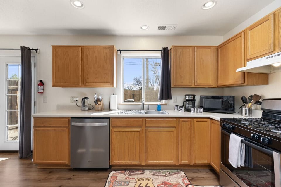 Fully stocked kitchen with everything you need for easy breakfasts, snacks, or a casual dinner in.