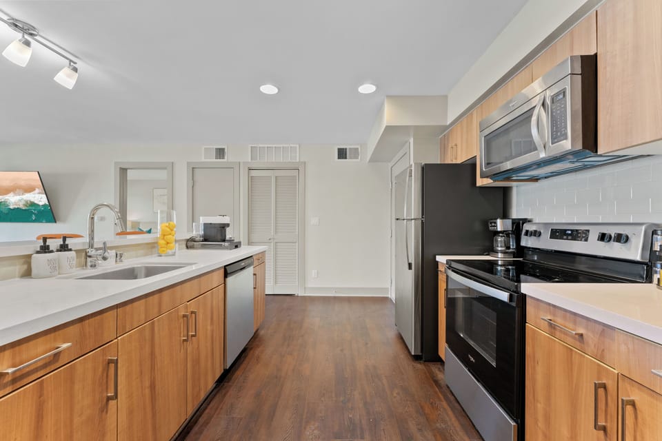 Gourmet simplicity—Sleek modern finishes meet a bright, open-concept layout.