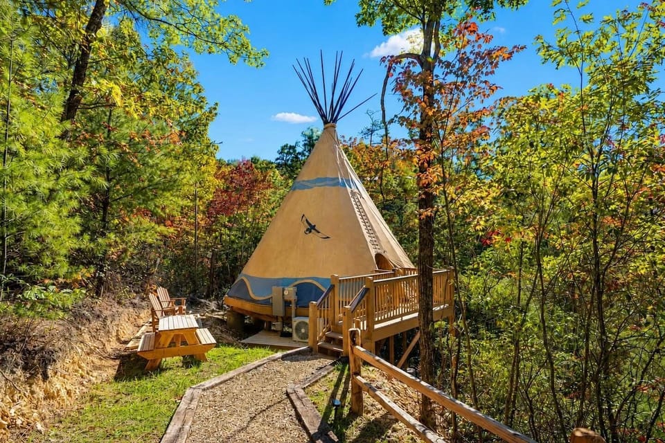 Luxury Smoky Mountain glamping tepee nestled inside gated Parkside Resort, offering a unique mountain retreat just minutes from Dollywood, Pigeon Forge Parkway, and top Smoky Mountain attractions.