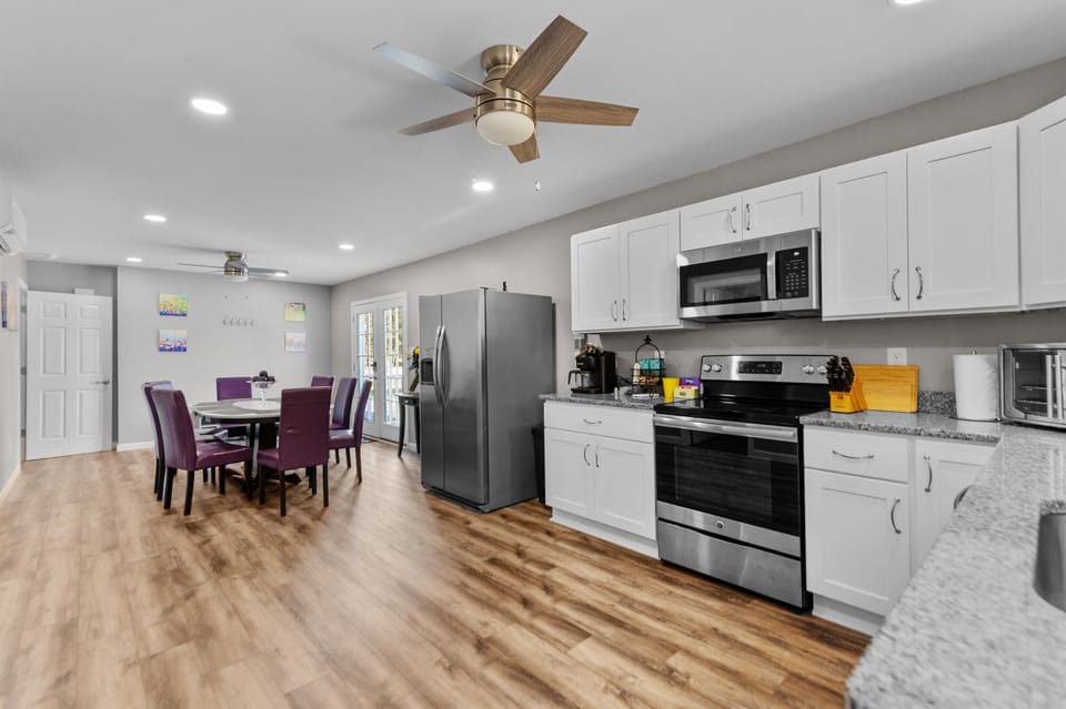 Kitchen & Dining: Sleek finishes and vibrant seating await your culinary adventures!