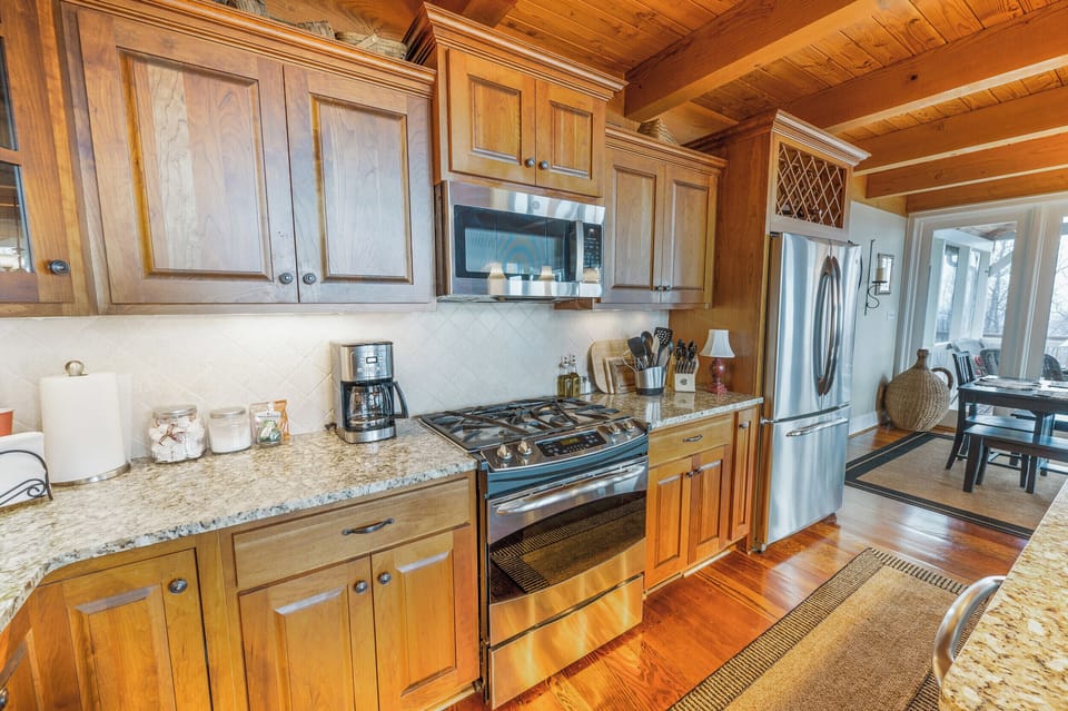 Kitchen: Chef's delight with stainless steel appliances and warm wood accents for culinary magic!