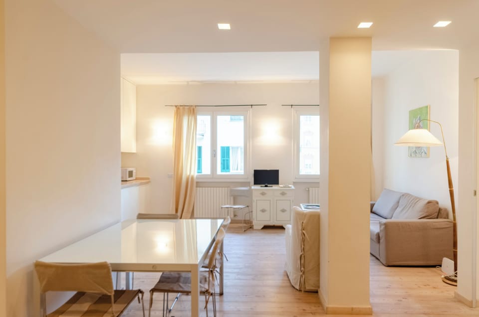 Family Apartment, 6 Bedrooms, Balcony, Mountain View | Living area | 32-inch flat-screen TV with cable channels